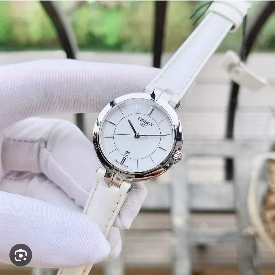 Đồng Hồ Nữ Tissot Flamingo T094.210.16.011.00 – 26mm, Mặt Trắng Thanh Lịch, Sapphire, Dây Da Trắng