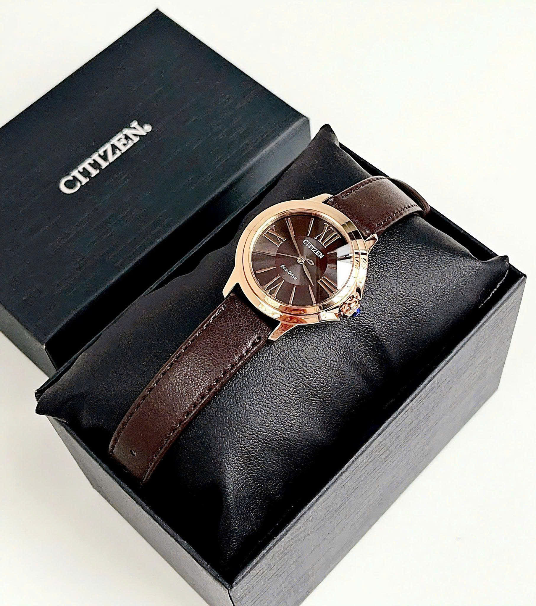 Đồng Hồ Citizen L Ceci Eco-Drive EM1163-09X Nữ Mặt Nâu Chocolate, Kính Sapphire, Vỏ Vàng Hồng