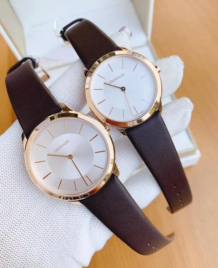 Đồng Hồ Đôi Calvin Klein Minimal K3M226G6 & K3M216G6 – Dây Da Nâu, Viền Gold, Mặt Trắng Thanh Lịch