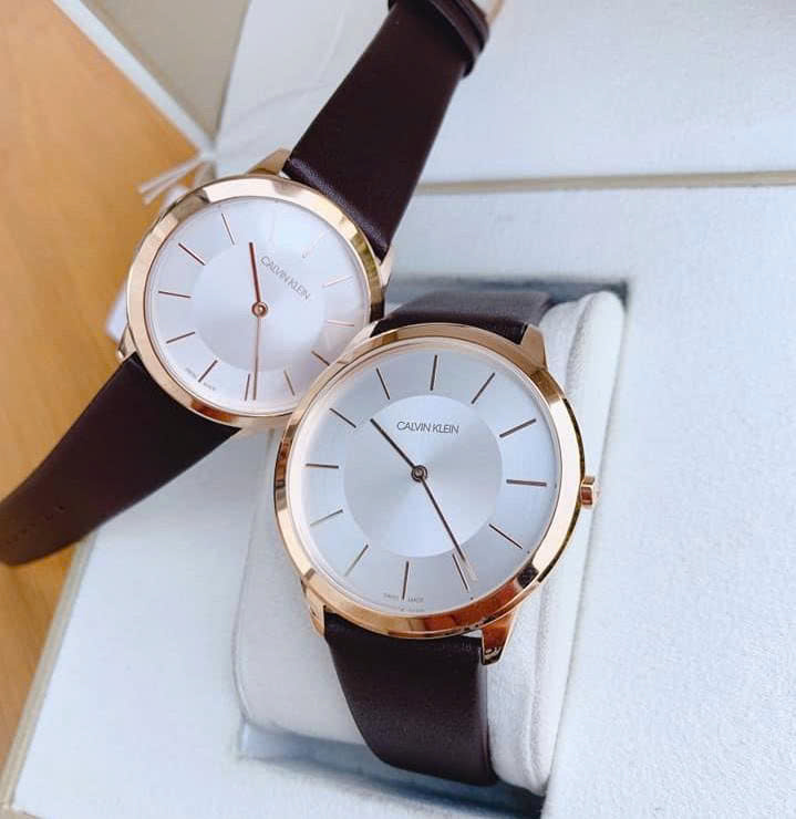 Đồng Hồ Đôi Calvin Klein Minimal K3M226G6 & K3M216G6 – Dây Da Nâu, Viền Gold, Mặt Trắng Thanh Lịch