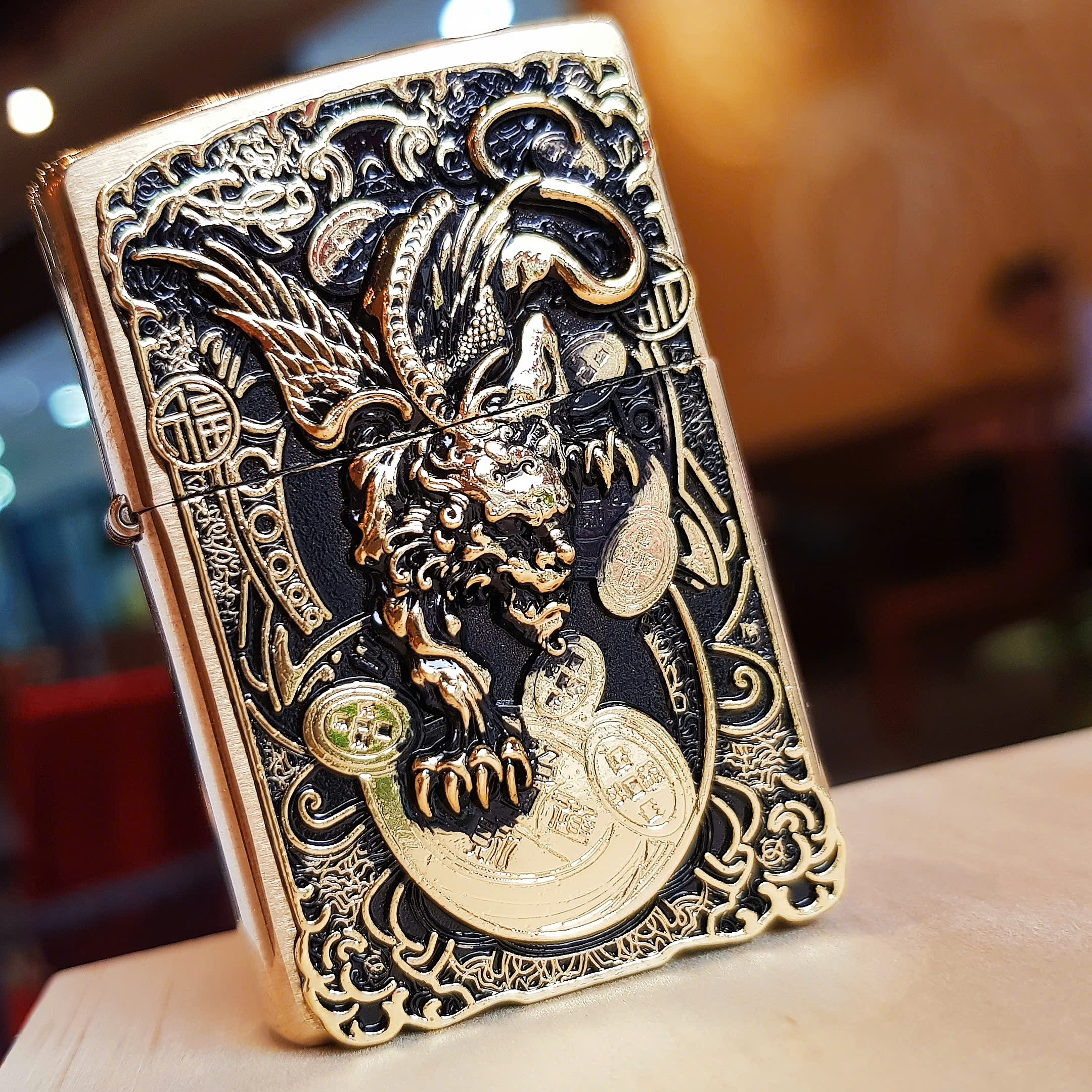 Bật lửa Zippo Kỳ lân ngậm kim tiền – Biểu tượng tài lộc và may mắn