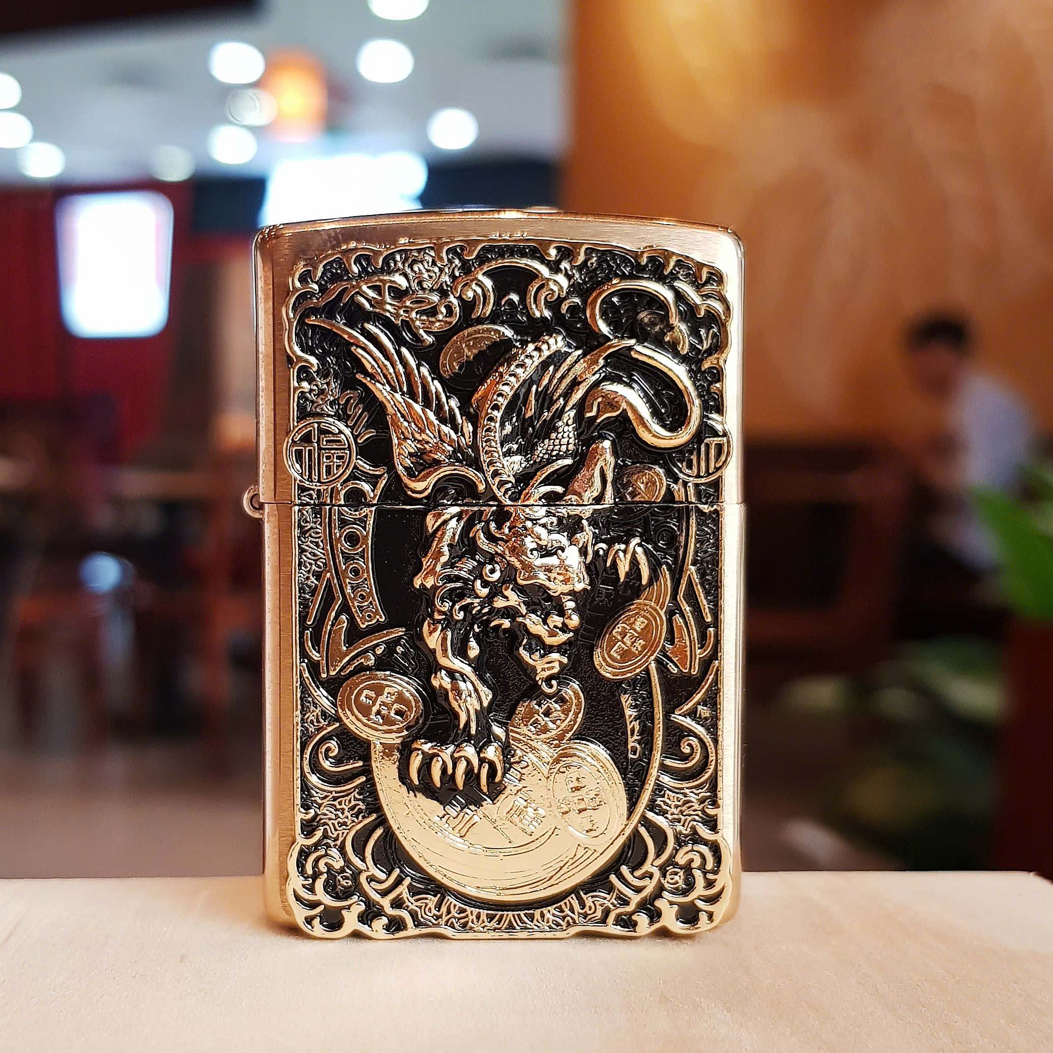 Bật lửa Zippo Kỳ lân ngậm kim tiền – Biểu tượng tài lộc và may mắn
