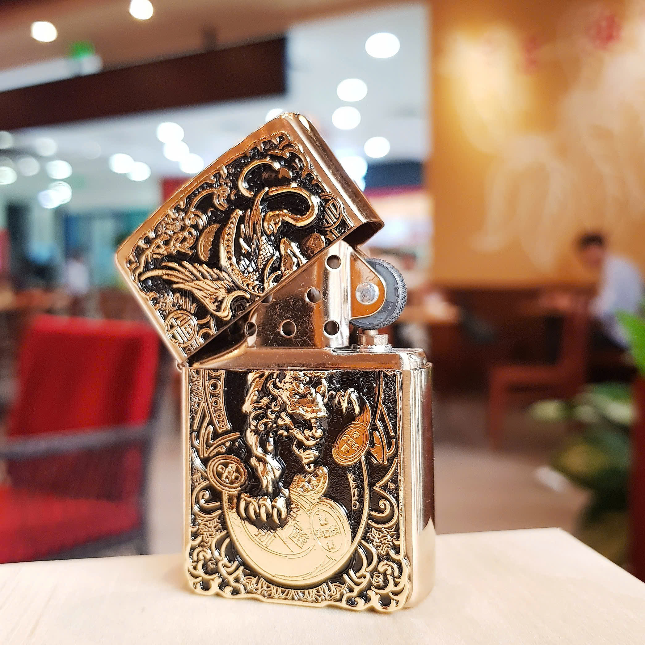 Bật lửa Zippo Kỳ lân ngậm kim tiền – Biểu tượng tài lộc và may mắn