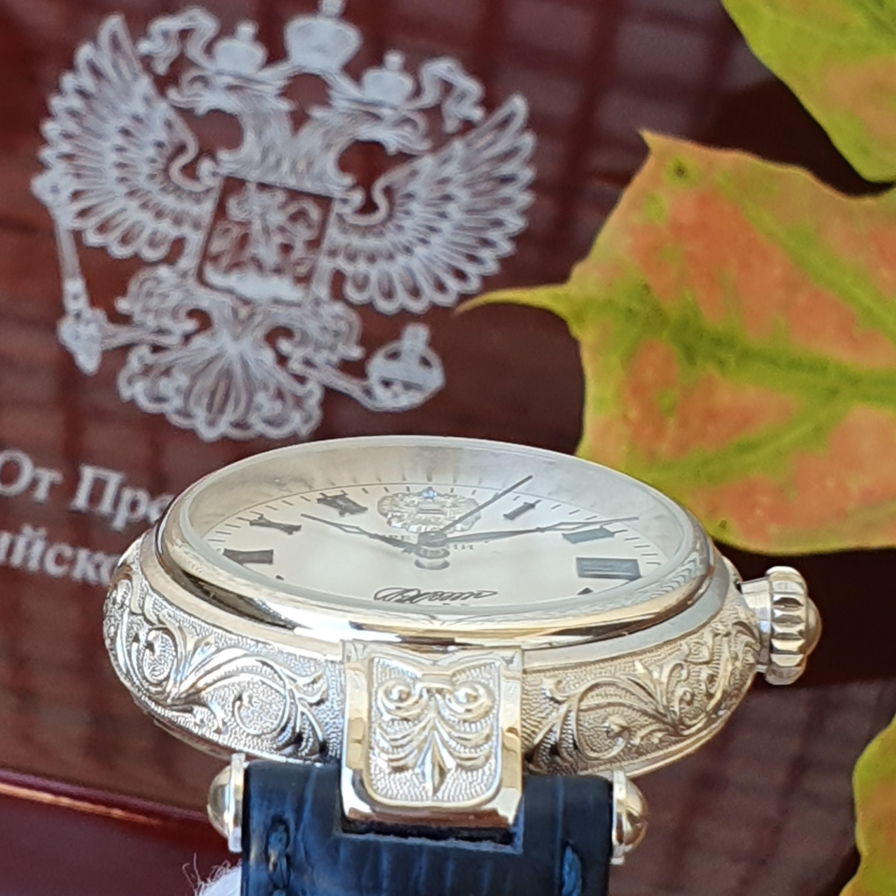 Đồng hồ 25213 bạc đúc nguyên khối chữ ký Tổng thống