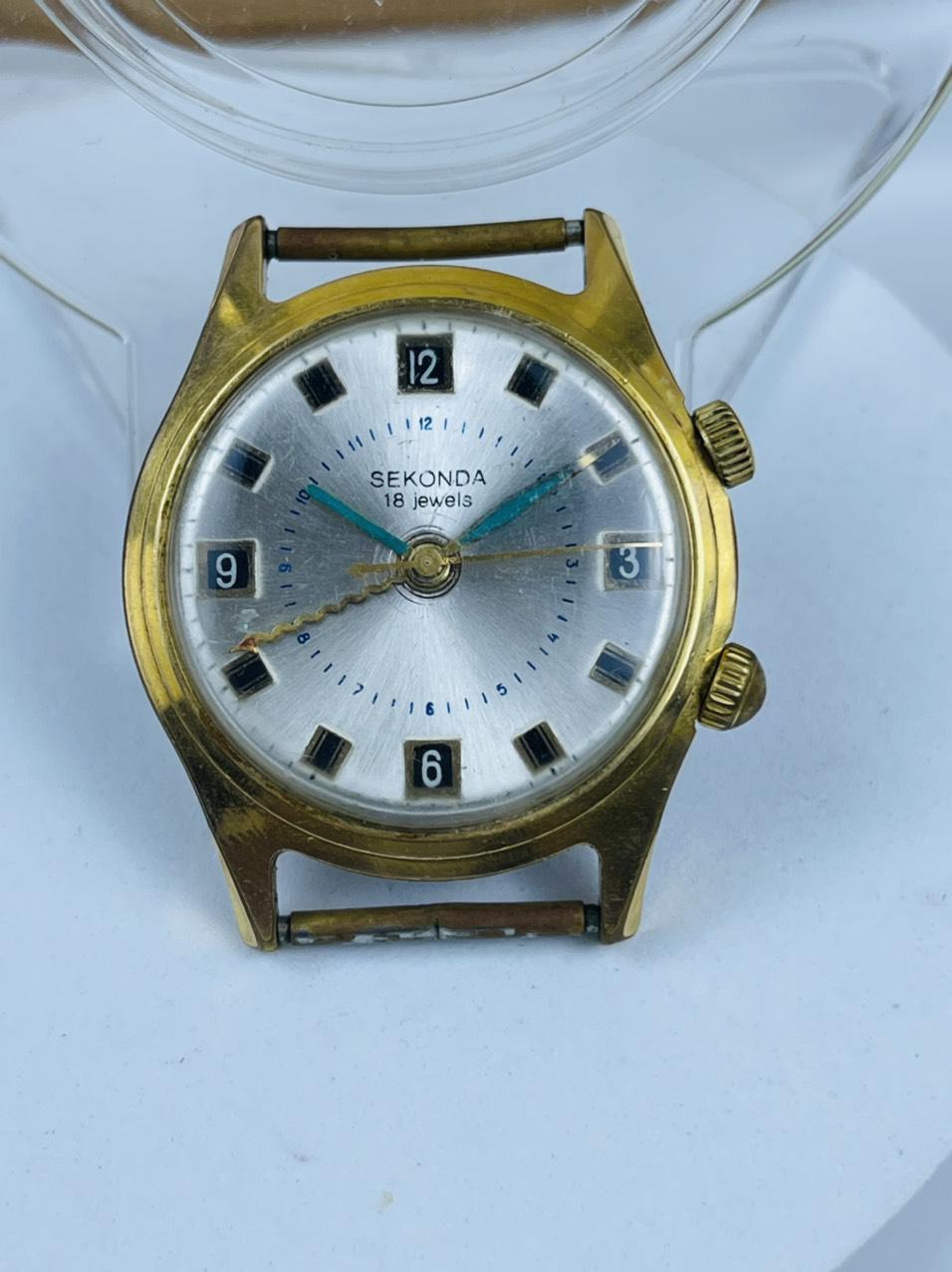 Đồng hồ Sekonda chuông reo 18 chân kính kim giun