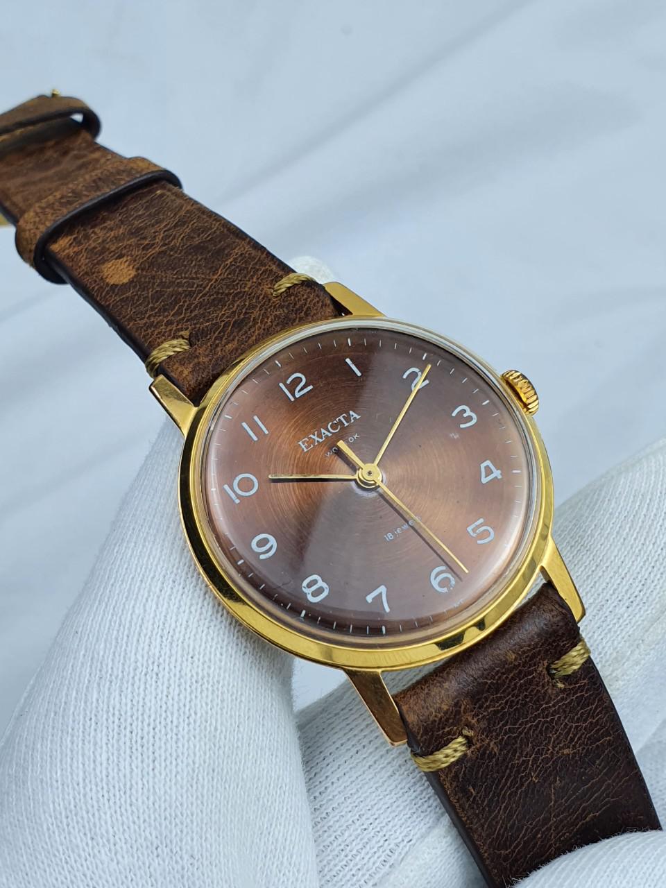Đồng hồ cổ Exacta Vostok 18 jewels bọc vàng máy cơ cót