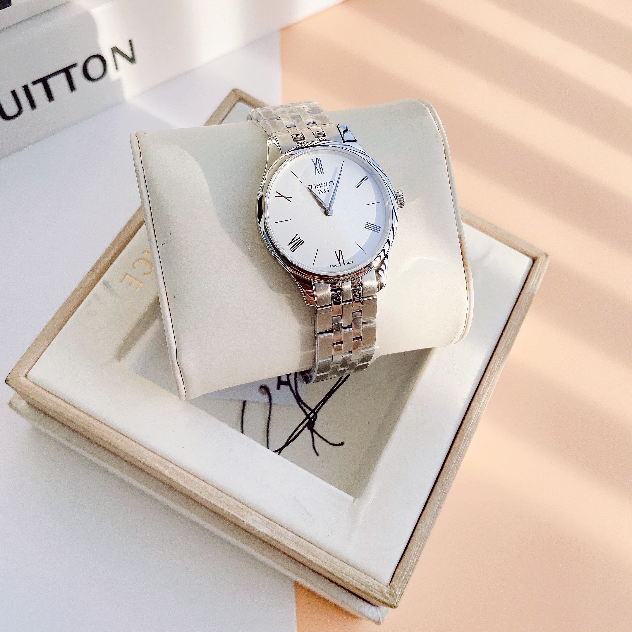 Đồng hồ Cặp đôi Tissot silver sang trọng: T063.409.11.018.00 vs T063.209.11.038.00