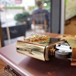 Bật Lửa Zippo 252BL072 - Biểu Tượng Trâu Cõng Kim Tiền Mạ Vàng 18k Trên Thân Với Ý Nghĩa Tài Lộc