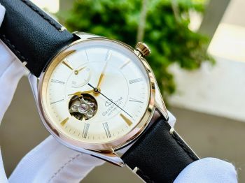 Đồng Hồ Orient Star Open Heart Netto RE-AT0201G00B Mặt Dial màu vàng champagne sang trọng pha chút hoài cổ, kết hợp kính cong hở tim độc đáo