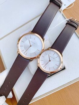 Đồng Hồ Đôi Calvin Klein Minimal K3M226G6 & K3M216G6 – Dây Da Nâu, Viền Gold, Mặt Trắng Thanh Lịch
