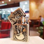 Bật lửa Zippo Kỳ lân ngậm kim tiền – Biểu tượng tài lộc và may mắn