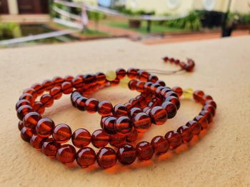 Chuỗi Hổ Phách 108 hạt - 7ly huyết phách