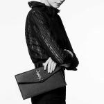 Túi Cầm Tay Nữ Yves Saint Laurent YSL Uptown Pouch In Grain De Poudre Embossed Leather Màu Đen Size 27